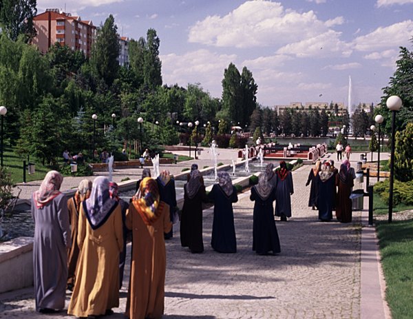 a group of women go for a stroll in Dikmen Park